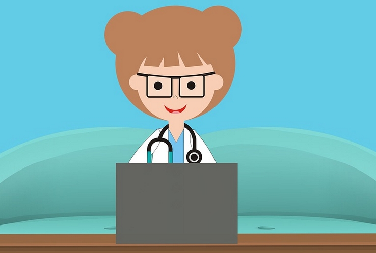 a nurse using a laptop